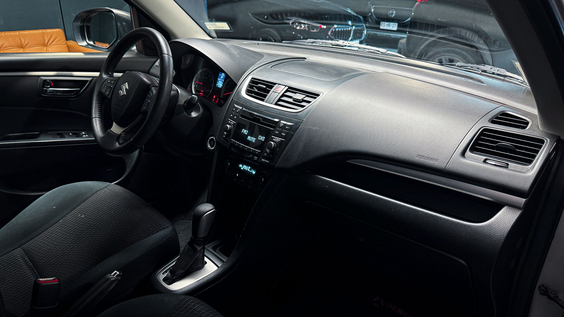 Suzuki Swift — foto 13 de 26